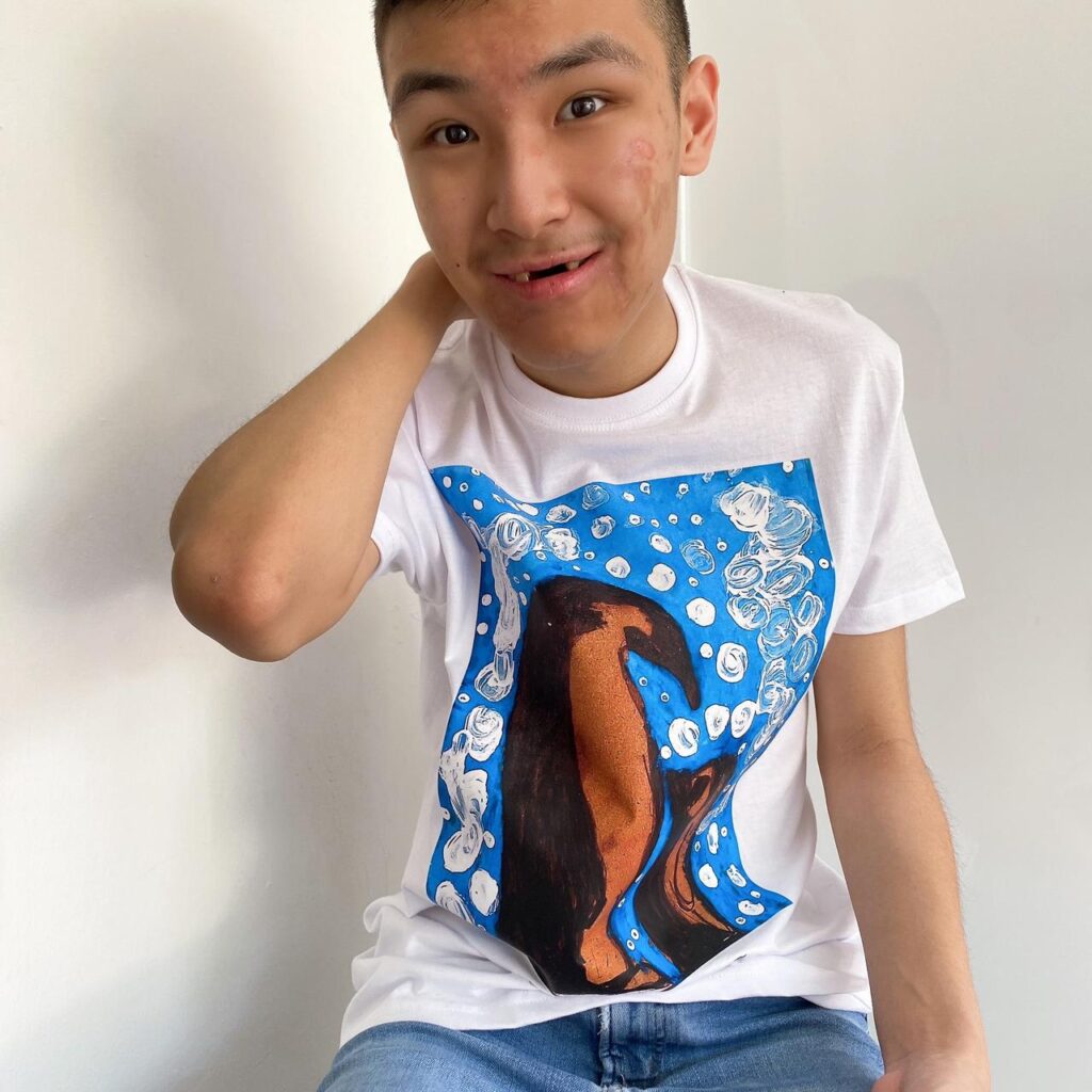 Joshua in Penguin T-Shirt